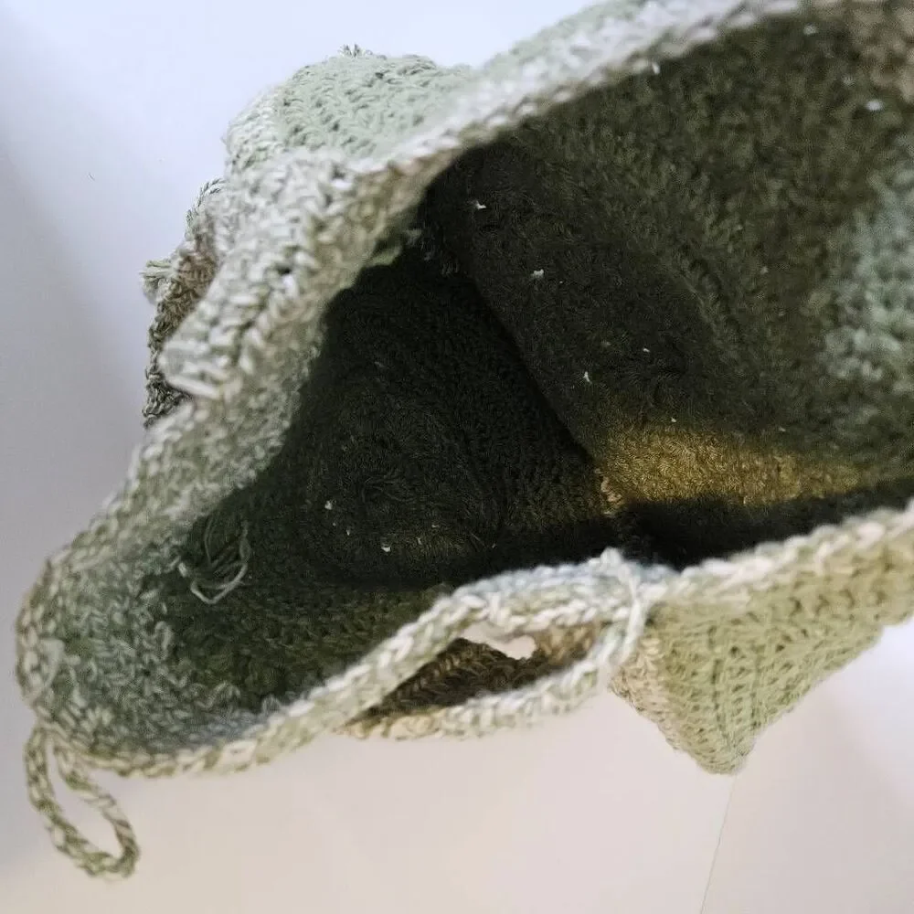 Handmade crocheted sage green boho purse with fringe.